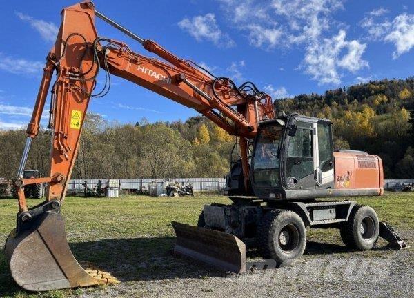 Hitachi ZX 210W-3 حفارات بعجل