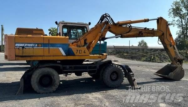 Hyundai Robex 200 W-2 حفارات بعجل