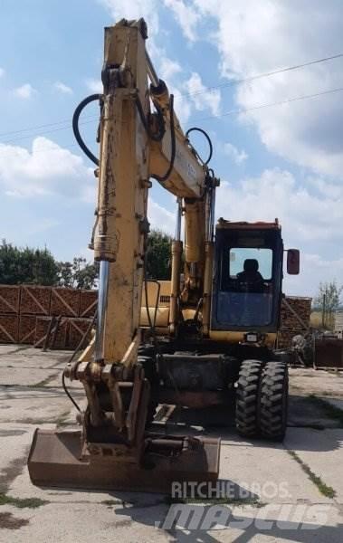 Komatsu PW 170 حفارات بعجل