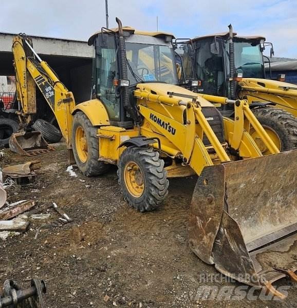 Komatsu WB 93 R لوادر ذات جرافات عكسية