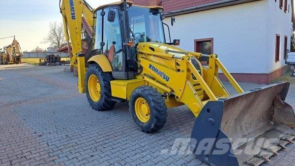 Komatsu WB 93 R لوادر ذات جرافات عكسية