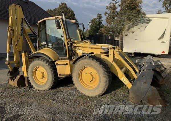 Komatsu WB 97 S لوادر ذات جرافات عكسية