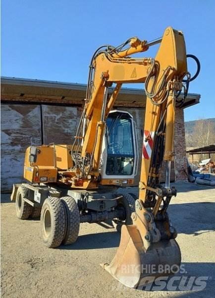 Liebherr A310 B حفارات بعجل