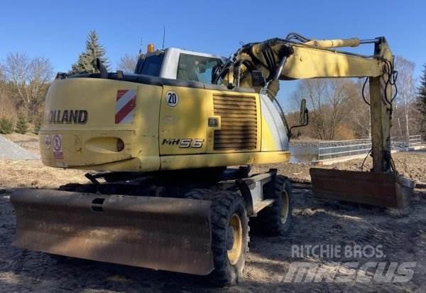 New Holland MH 5.6 حفارات بعجل