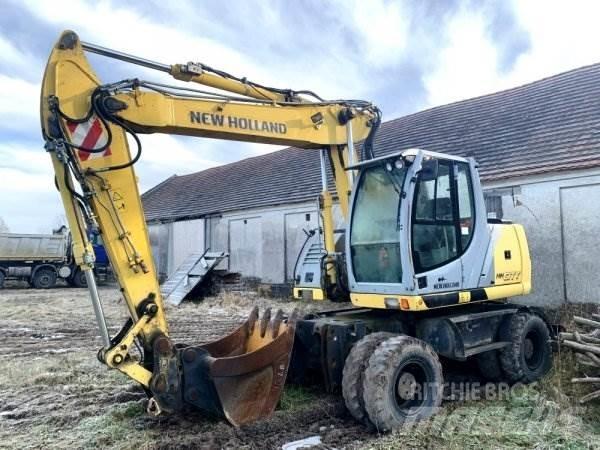New Holland MH City حفارات بعجل