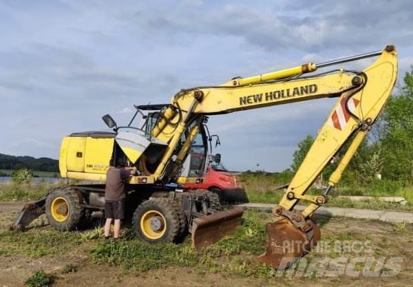 New Holland MH City حفارات بعجل