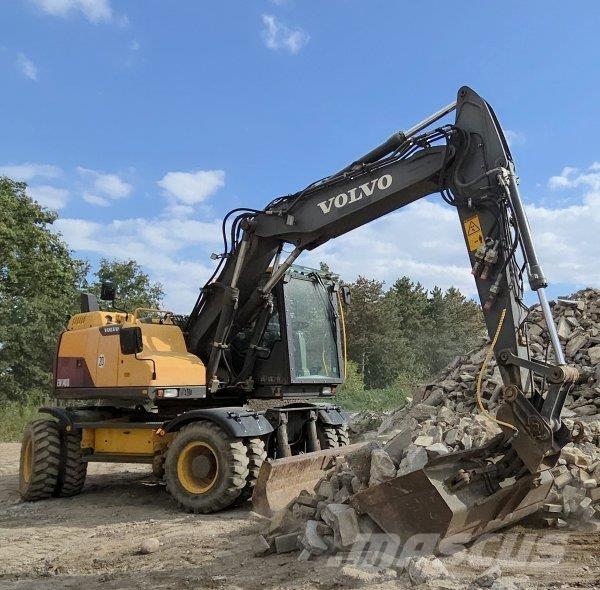 Volvo EW 140 D حفارات بعجل