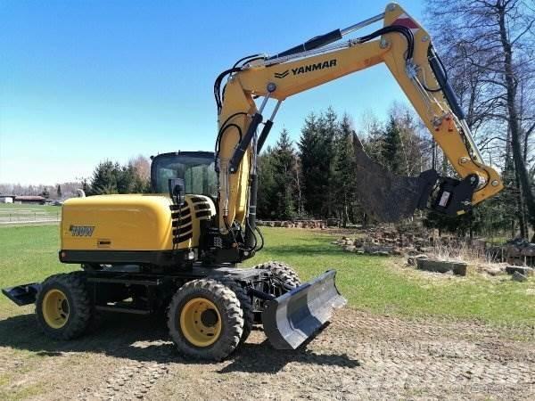 Yanmar B110 W Style حفارات بعجل