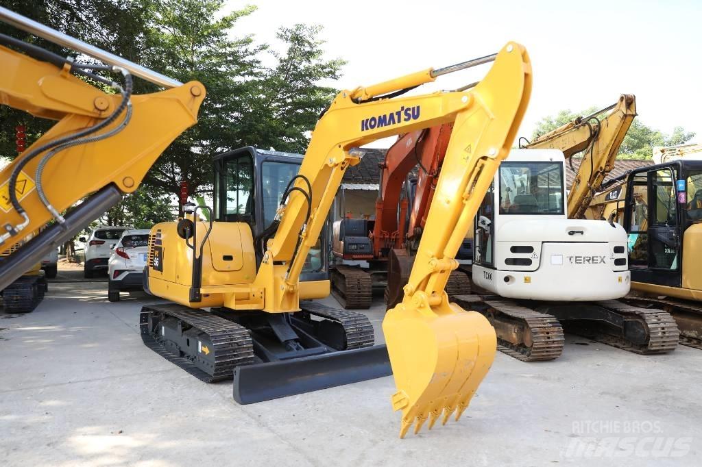 Komatsu PC 56-7 حفارات زحافة