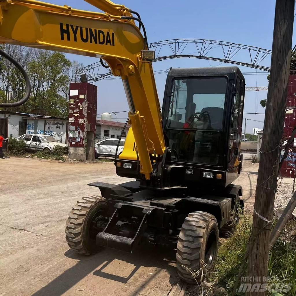 Hyundai R60W-7 حفارات بعجل