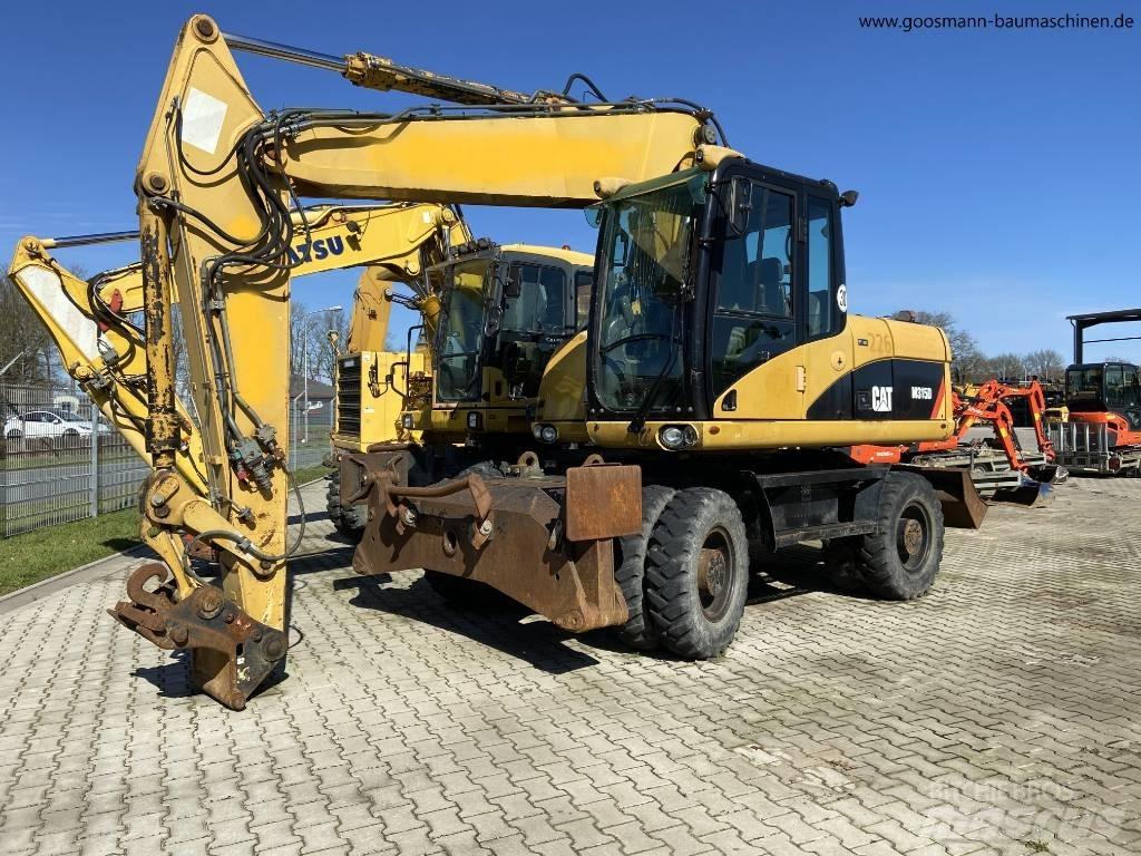 CAT M 315 D حفارات بعجل