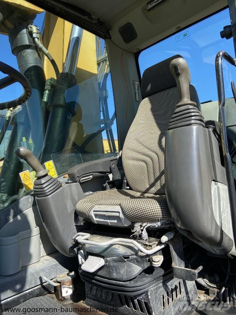 CAT M 315 D حفارات بعجل