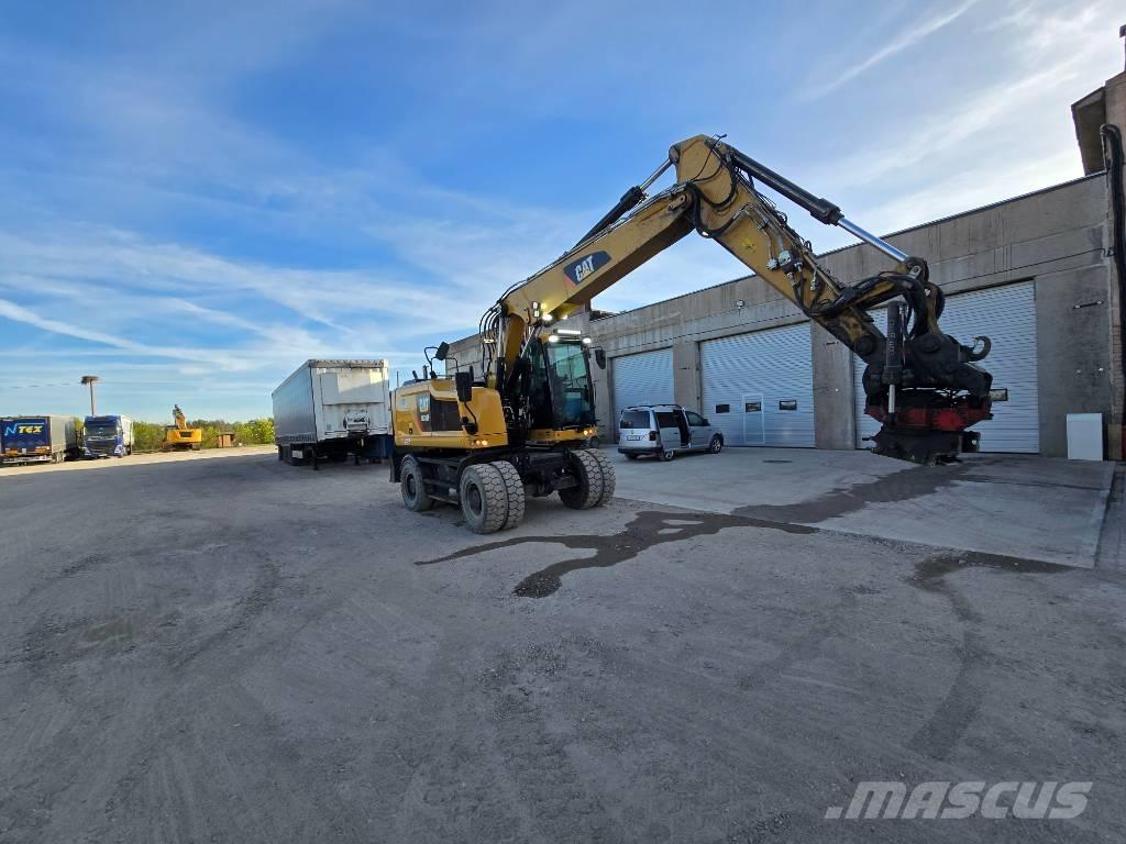 CAT M 318 F حفارات بعجل