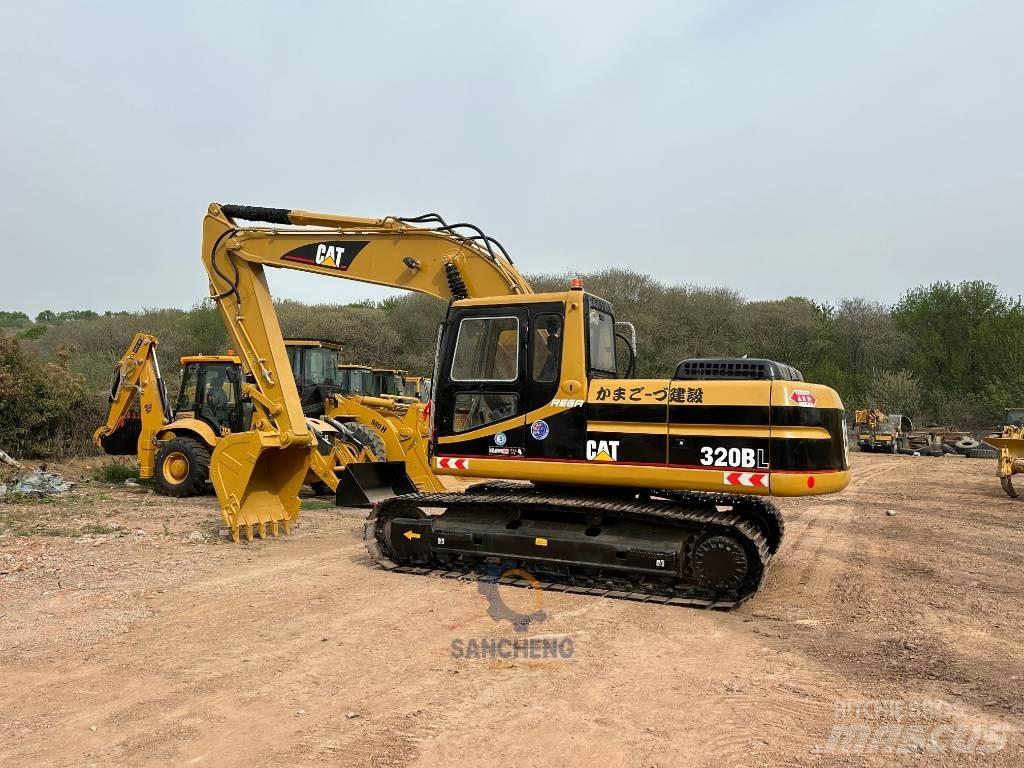 CAT 320 B حفارات زحافة