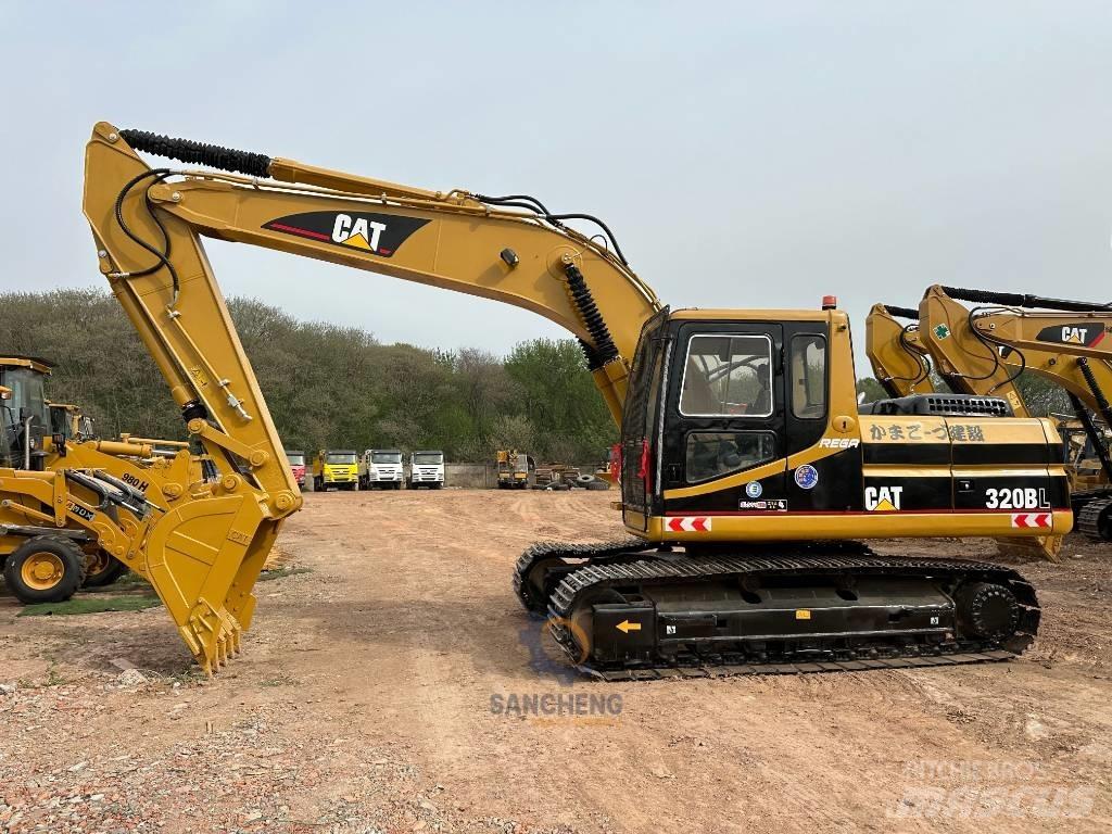 CAT 320 B حفارات زحافة