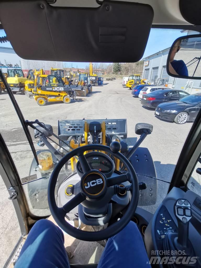 JCB 409 لوادر بعجل