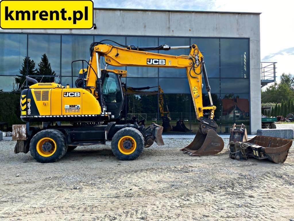 JCB JS 145 W حفارات بعجل