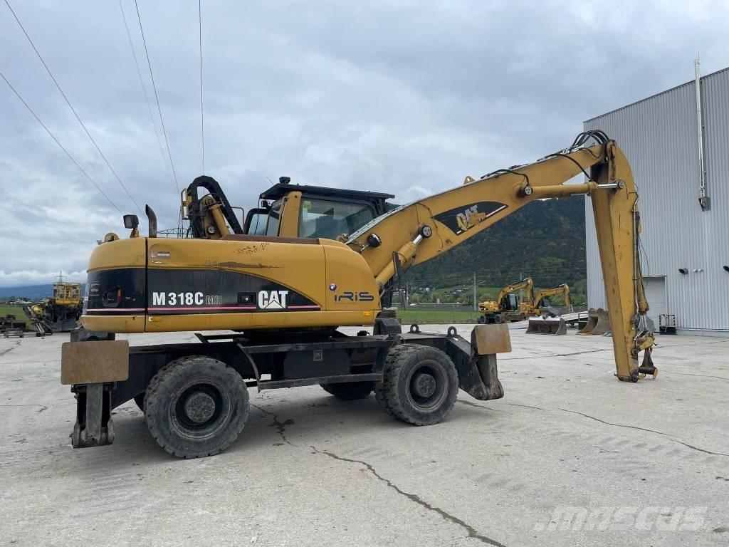 CAT M 318 C MH مناولات المخلفات / مناولات صناعية
