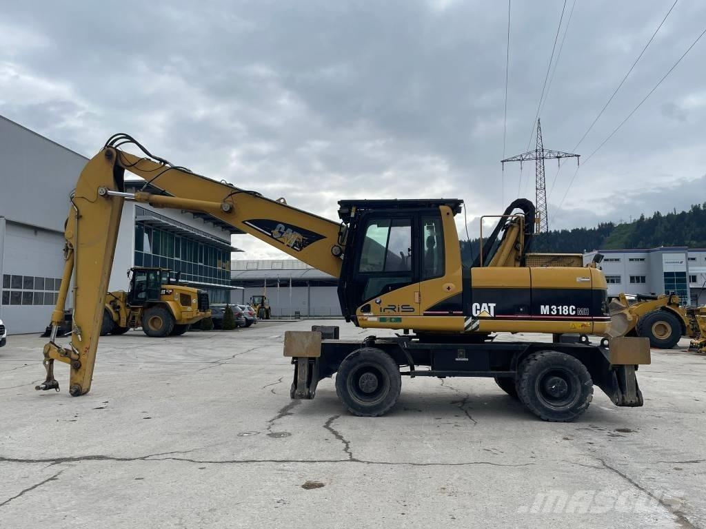 CAT M 318 C MH مناولات المخلفات / مناولات صناعية