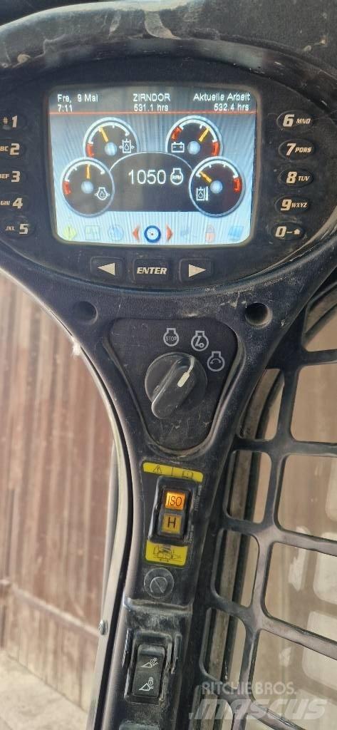 Bobcat T 450 لوادر انزلاقية التوجيه