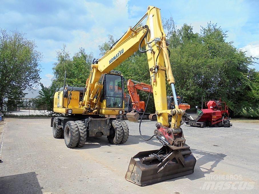 Komatsu PW 140-7 حفارات بعجل
