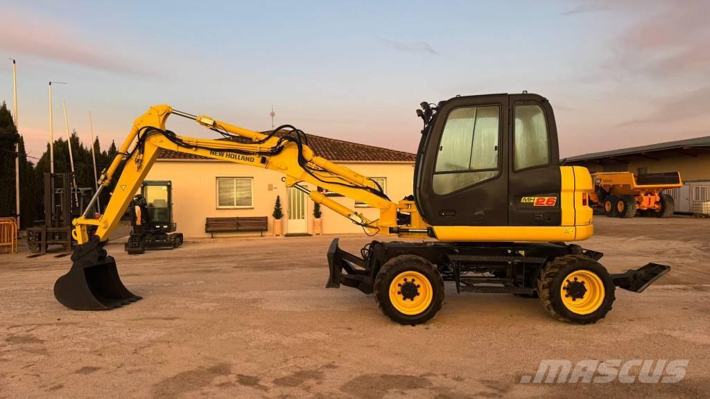 New Holland MH 2.6 حفارات بعجل