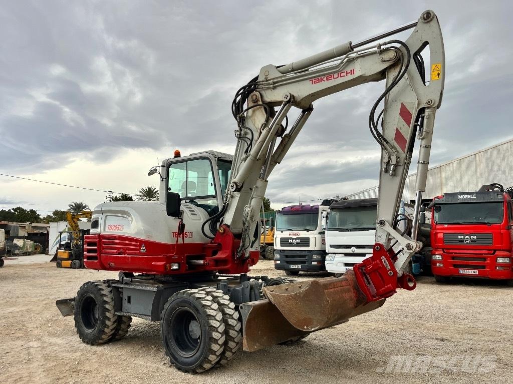 Takeuchi TB 295 W حفارات بعجل