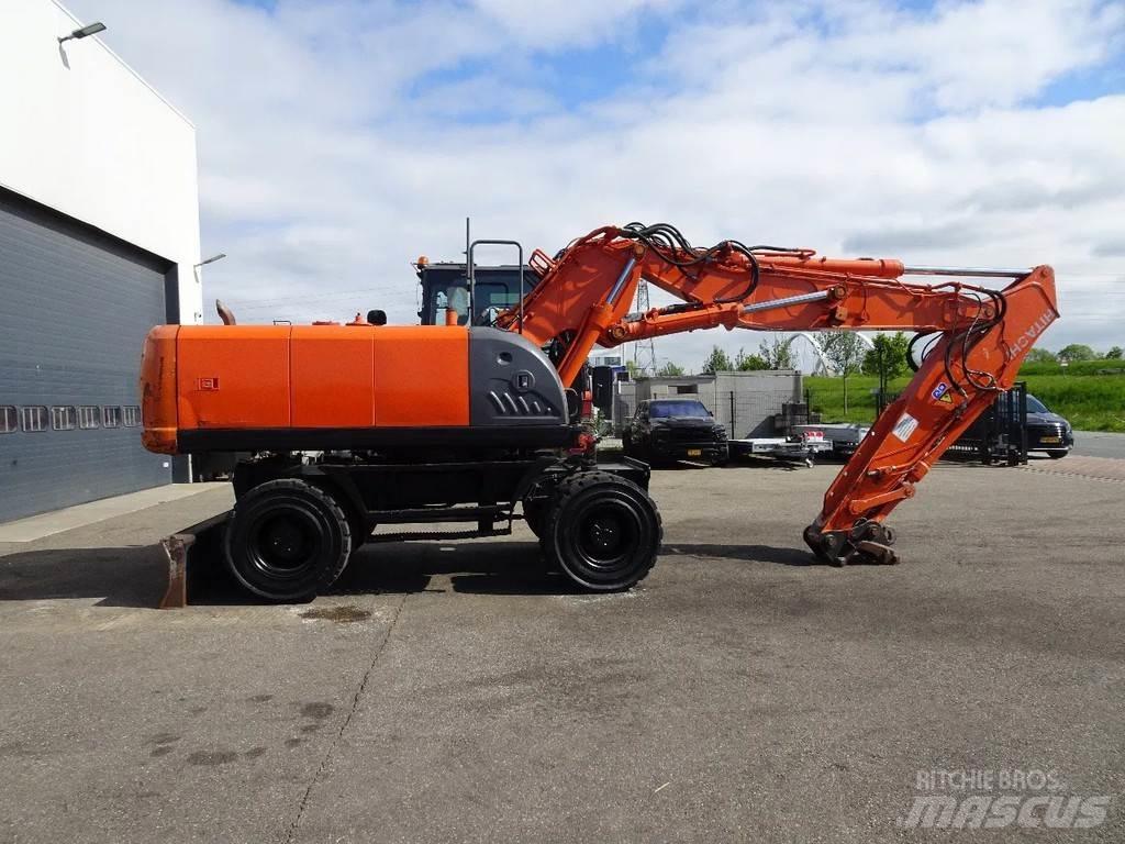 Hitachi ZX210W-3 حفارات بعجل