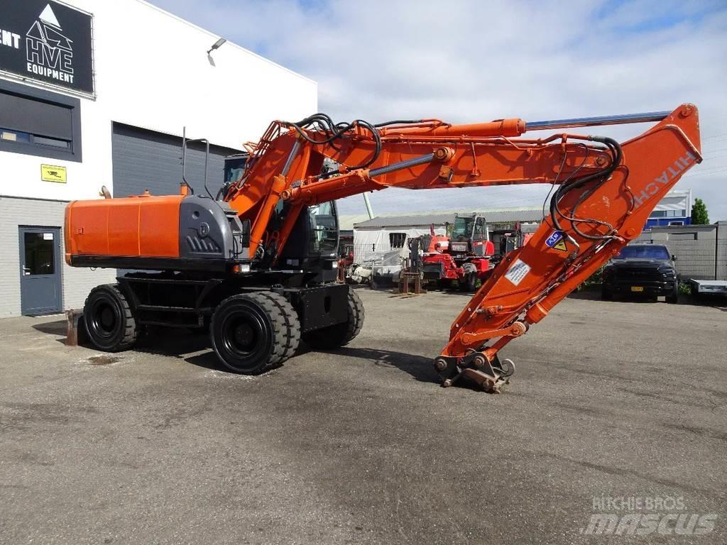 Hitachi ZX210W-3 حفارات بعجل