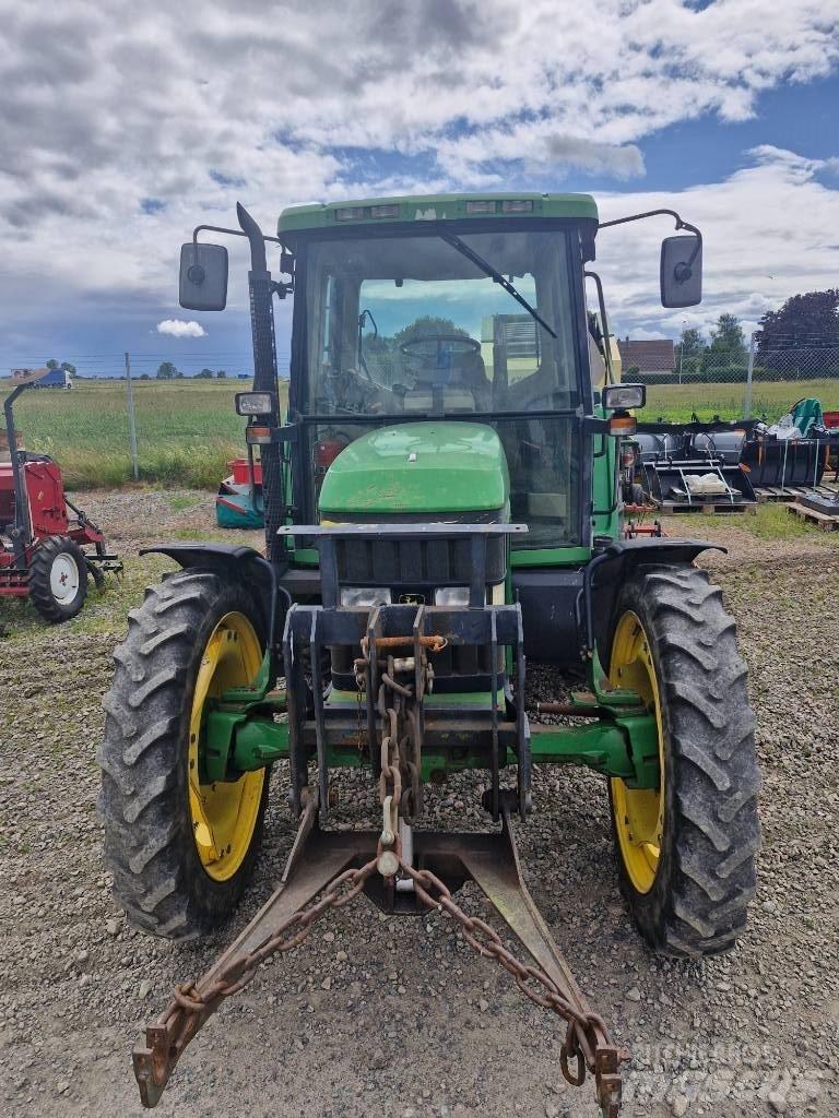 John Deere 6410 الجرارات