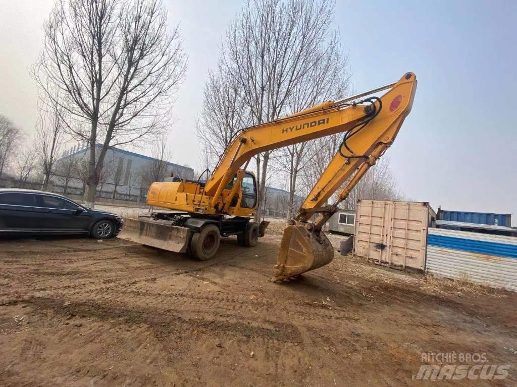 Hyundai R210WD حفارات بعجل