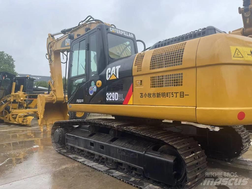CAT 329 D L حفارات زحافة