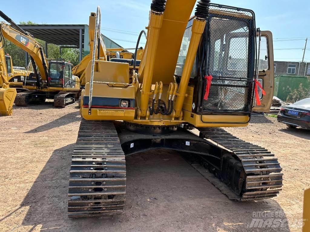 CAT 320 B حفارات زحافة