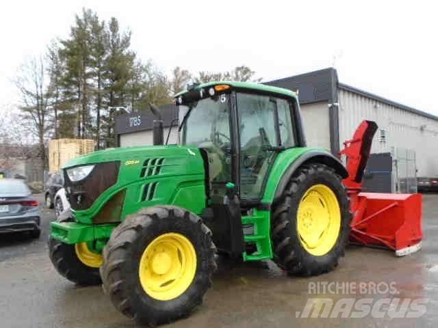 John Deere 6115 M الجرارات