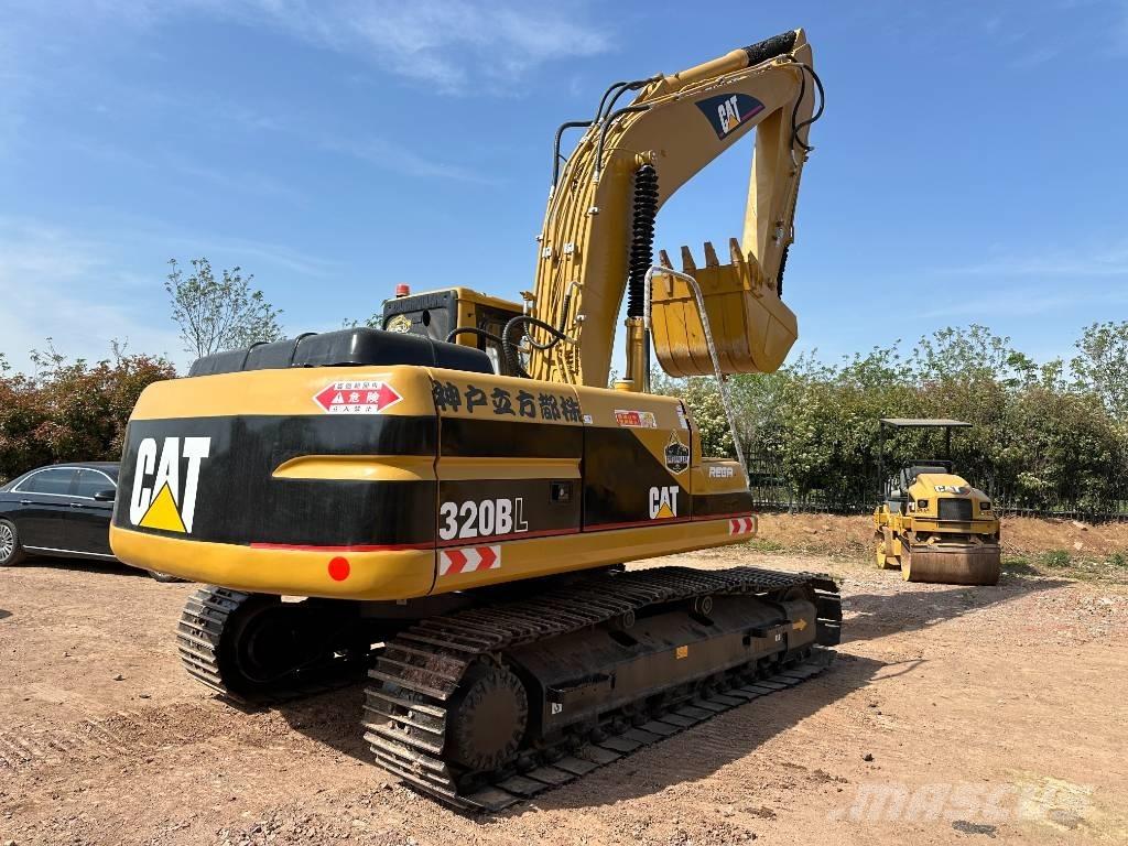 CAT 320 B حفارات زحافة