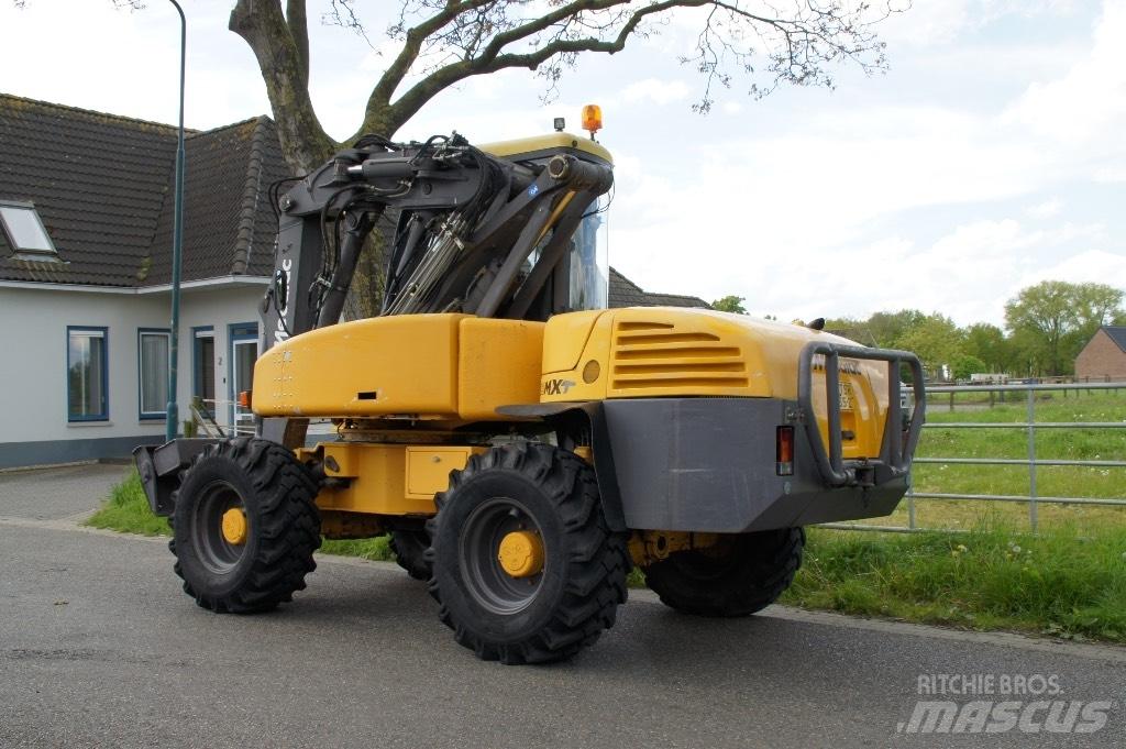 Mecalac 12 MXT حفارات بعجل