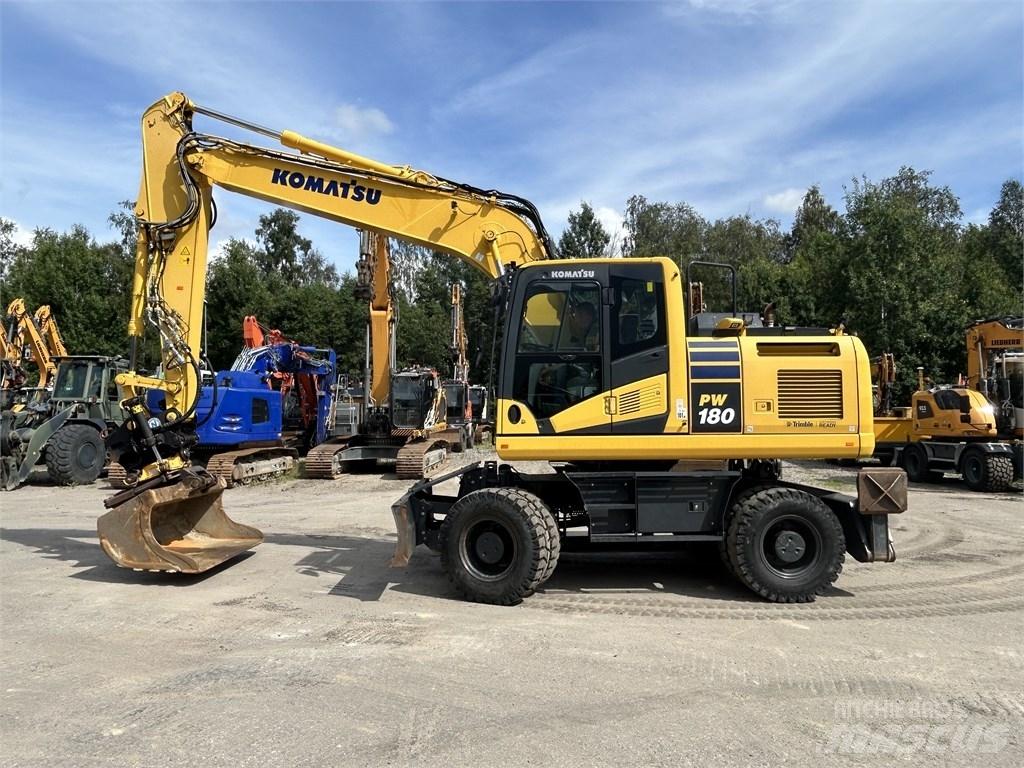 Komatsu PW 180-11 حفارات بعجل