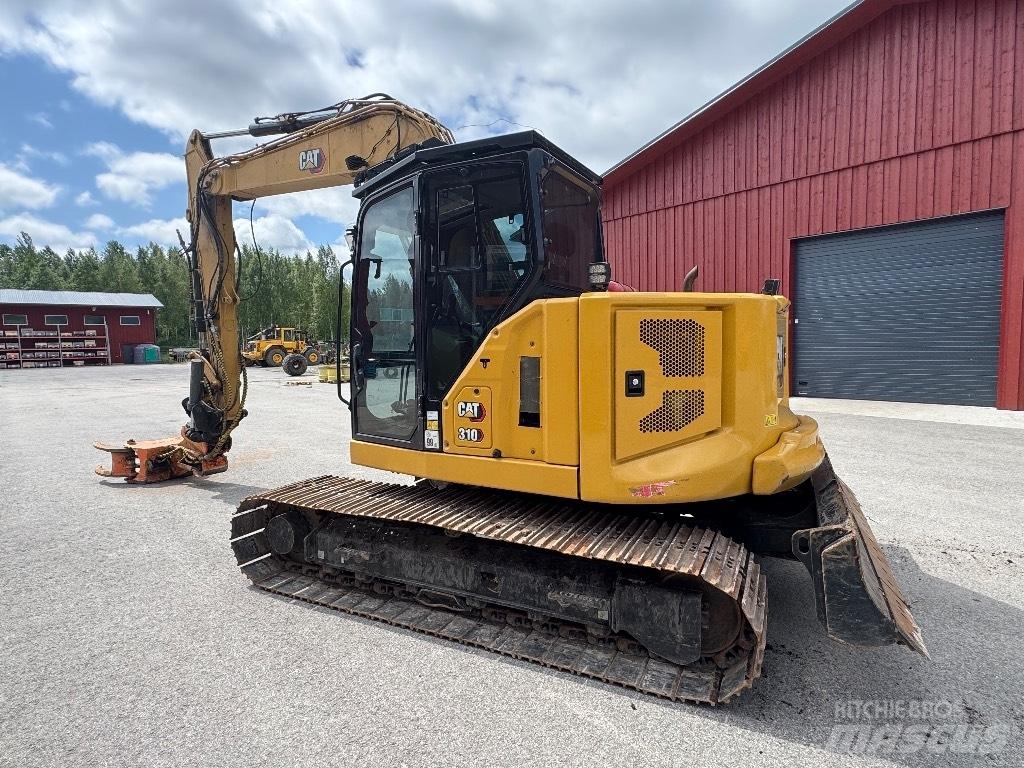 CAT 310-07 حفارات زحافة