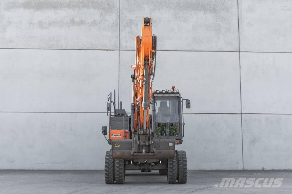 Doosan DX 140 W حفارات بعجل