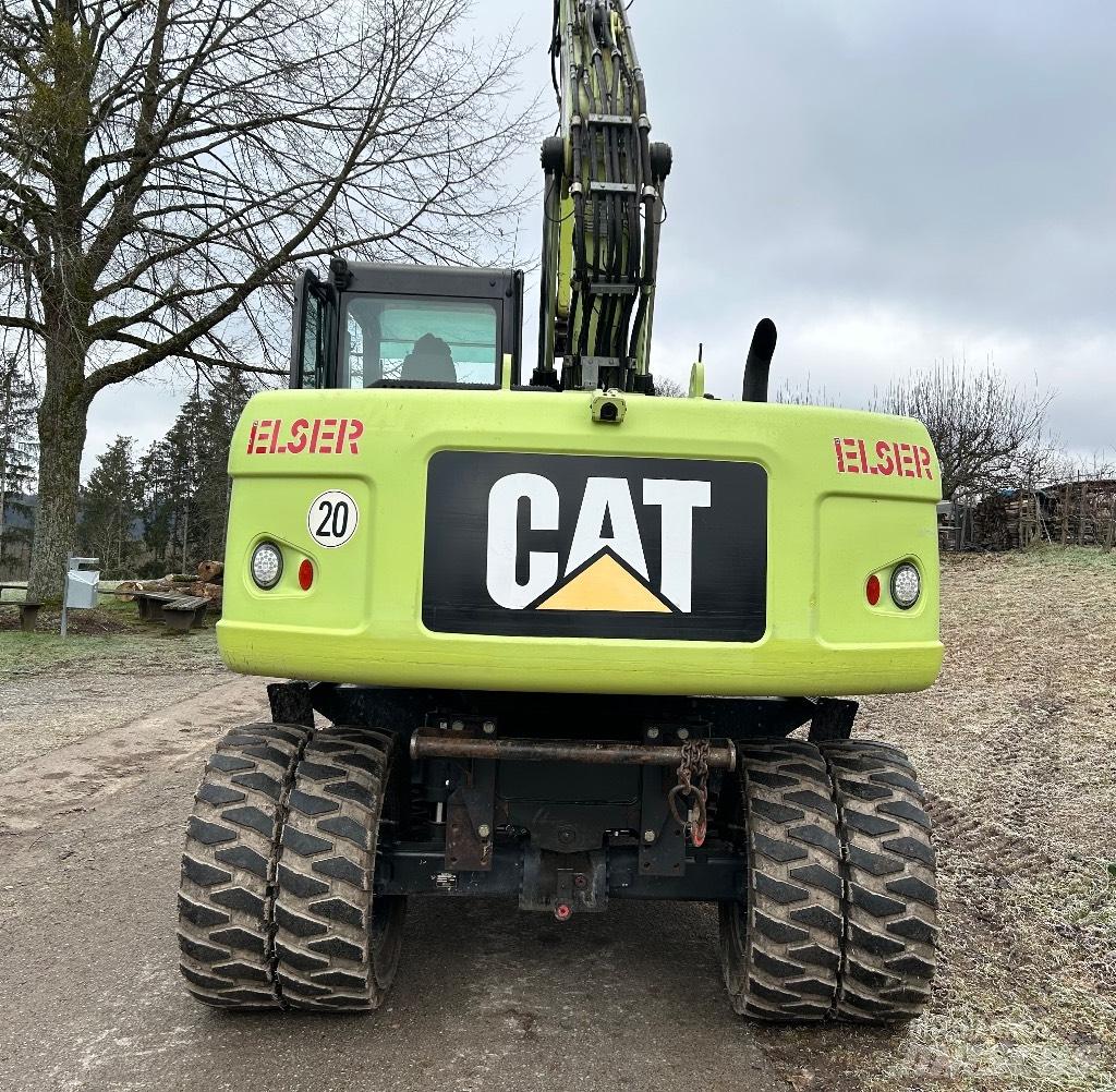 CAT M 316 D حفارات بعجل
