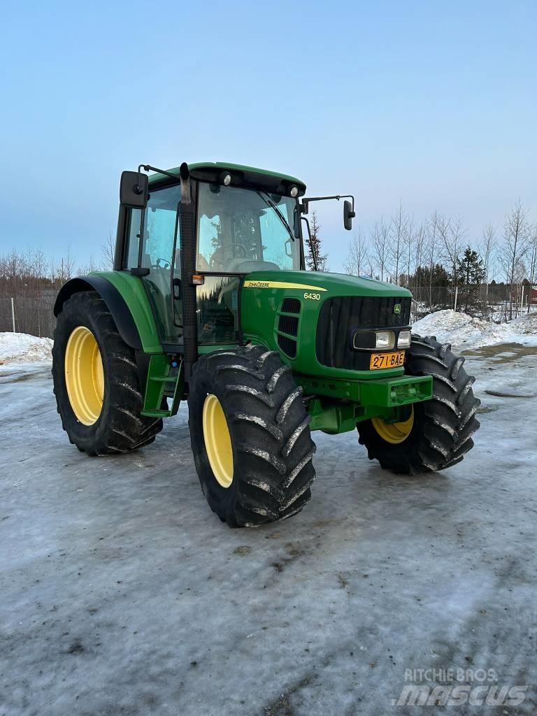 John Deere 6430 STD الجرارات