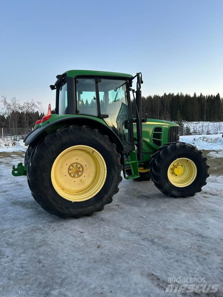 John Deere 6430 STD الجرارات
