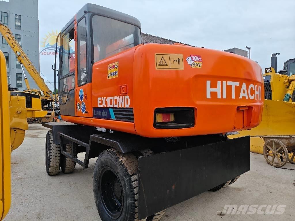 Hitachi EX 100 W D حفارات بعجل