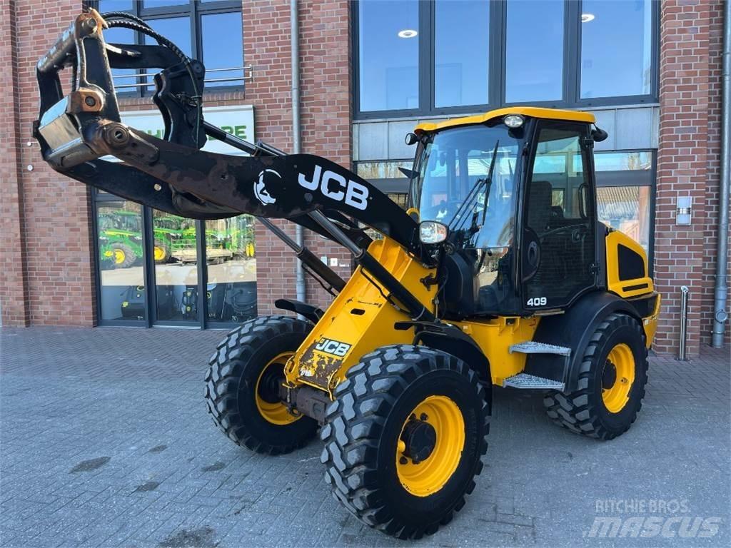 JCB 409 لوادر بعجل