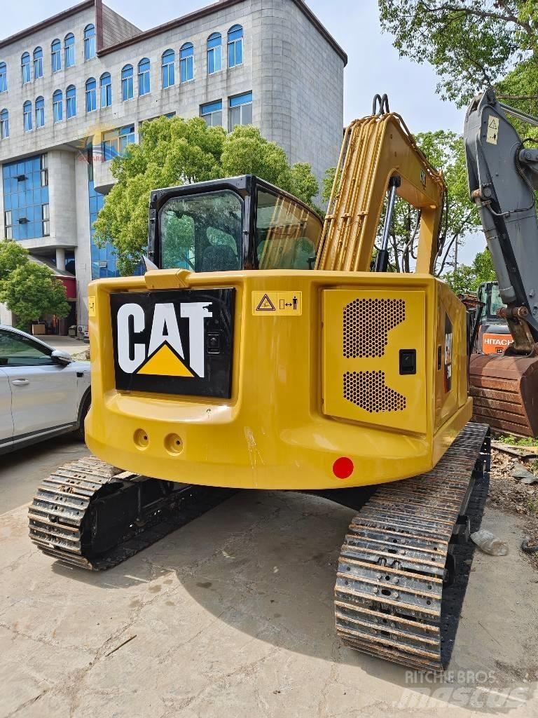 CAT 310 حفارات زحافة