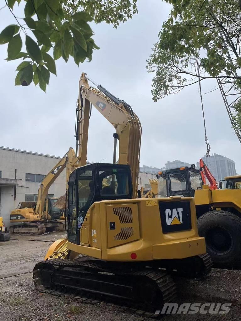 CAT 310 حفارات زحافة