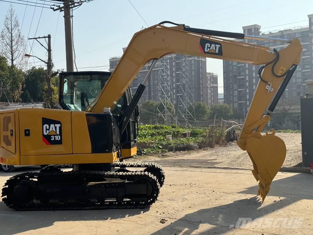 CAT 310 حفارات زحافة