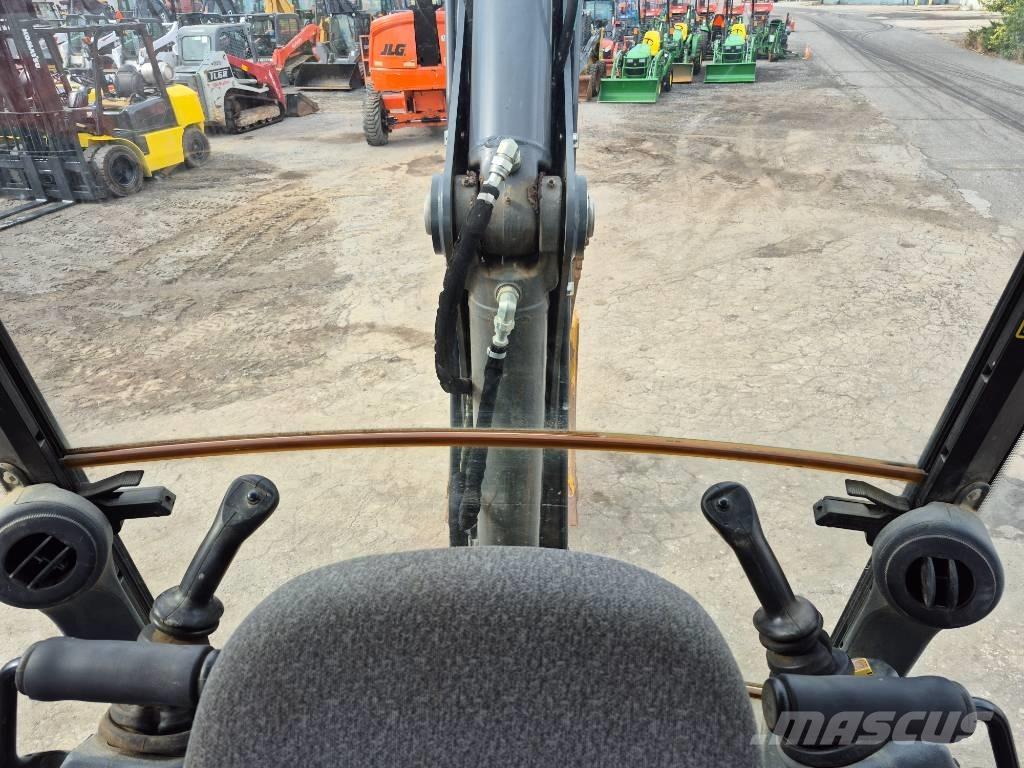 John Deere 310 لوادر ذات جرافات عكسية