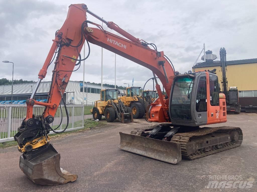 Hitachi ZX 135 US حفارات زحافة