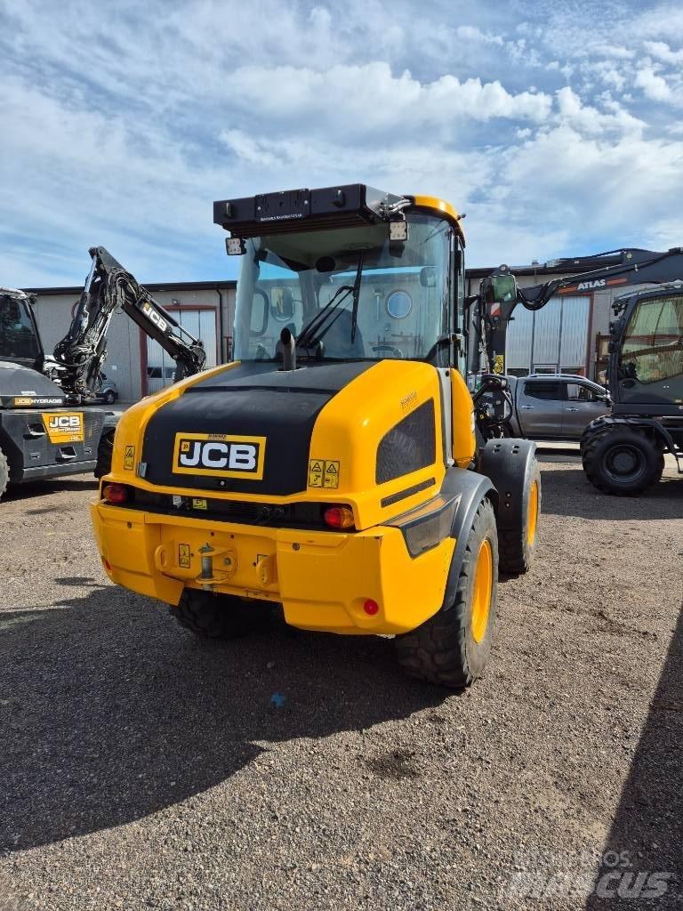 JCB 409 لوادر بعجل